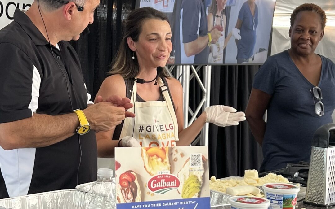 Lasagna Love cooks at Galbani's Italian Heritage Festival in Buffalo, New York. Pictured are Galbani's celebrity Chef Marco and Regional Leader Jenn Balkota from Lasagna Love.