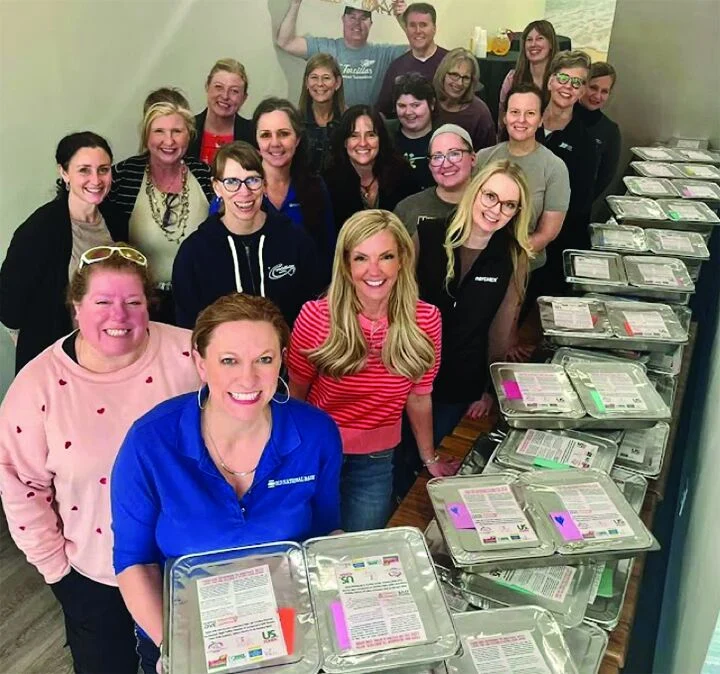 Apple Valley Chamber CORE Women assemble lasagnas for families in need