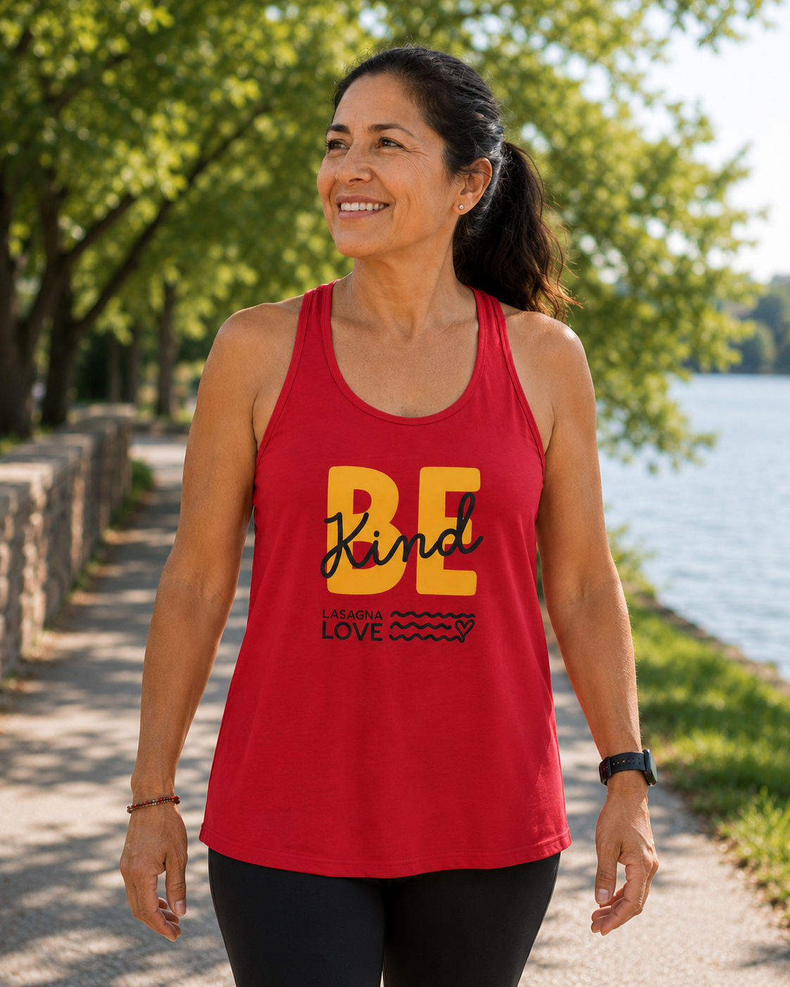 🧡 Be Kind. Give Back. Tank It Forward. 💪✨ Women’s Racerback Tank